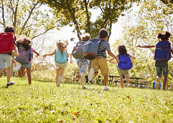 children running in a field