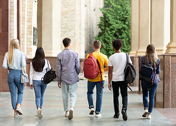 A group of teenagers walking to class