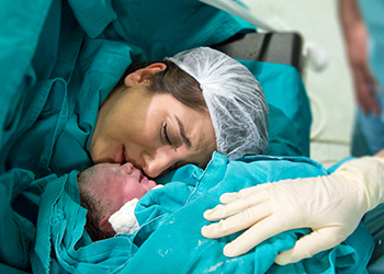 A mother and baby after a cesarean birth