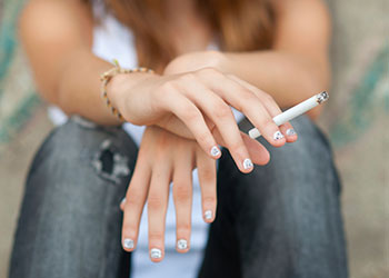 A woman smoking a cigarette