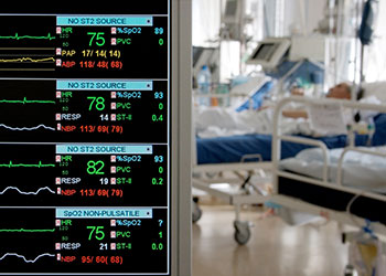 A patient recovers from surgery in a hospital room