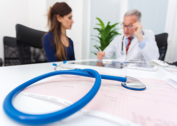 A Doctor and patient with an EGC printout