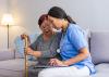 A nurse discusses the Frailty Index with an older woman