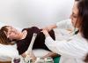 A women having an abdominal examination